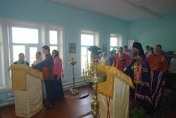 Первая Литургия в возрождающемся храме